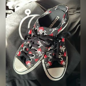 MTV addition Converse low tops with jackass with red devil hat. Good condition